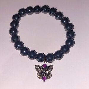 Hematite Bracelet Beautiful.Feels Great On , Handmade .Butterfly Attatched .
